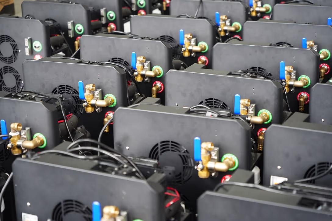 Assembled units on the line, wired and waiting for test